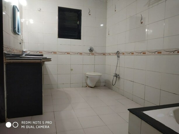 Imagen de la habitación del Hotel Krish Holiday Inn. Foto 20