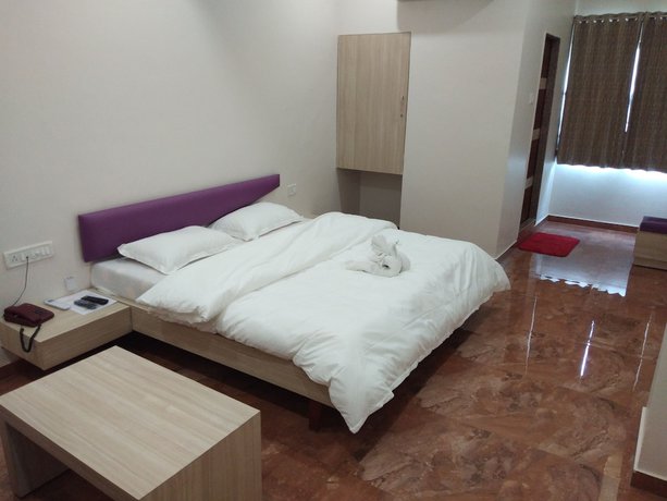 Imagen de la habitación del Hotel Krishna, Anand. Foto 9
