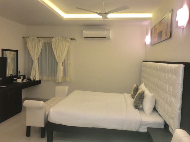 Imagen de la habitación del Hotel Krishna Beach Resort and Spa. Foto 16