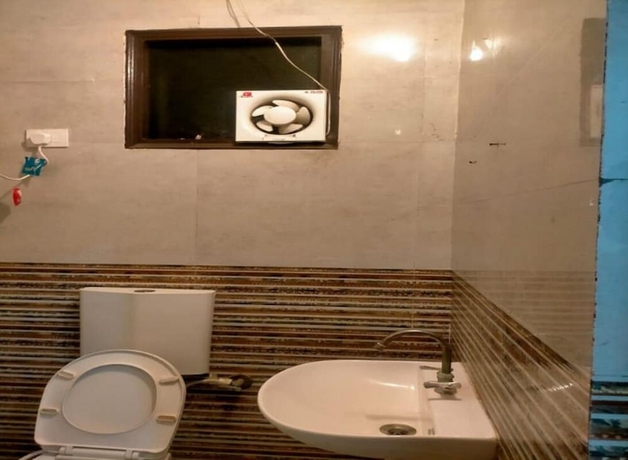 Imagen de la habitación del Hotel Krishna Cottage - Vrindavan. Foto 11