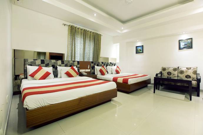 Imagen de la habitación del Hotel Krishna Deluxe. Foto 5