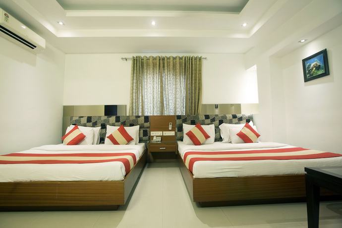 Imagen de la habitación del Hotel Krishna Deluxe. Foto 6