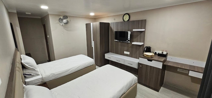 Imagen de la habitación del Hotel Krishna Homestay. Foto 8