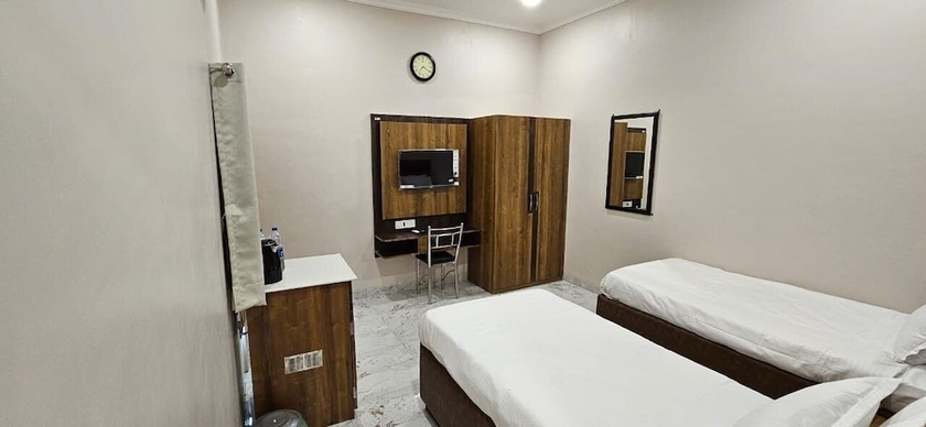 Imagen de la habitación del Hotel Krishna Homestay. Foto 11