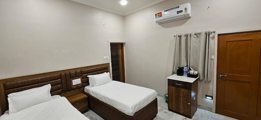 Imagen de la habitación del Hotel Krishna Homestay. Foto 13