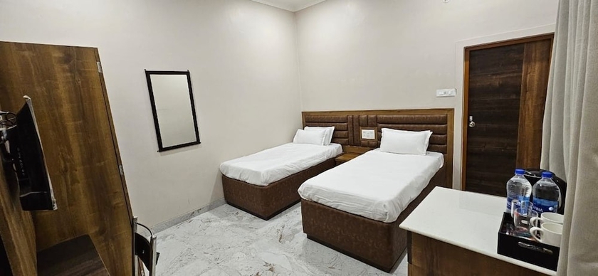 Imagen de la habitación del Hotel Krishna Homestay. Foto 15