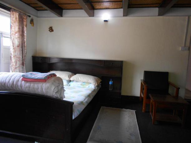 Imagen de la habitación del Hotel Krishna House. Foto 4