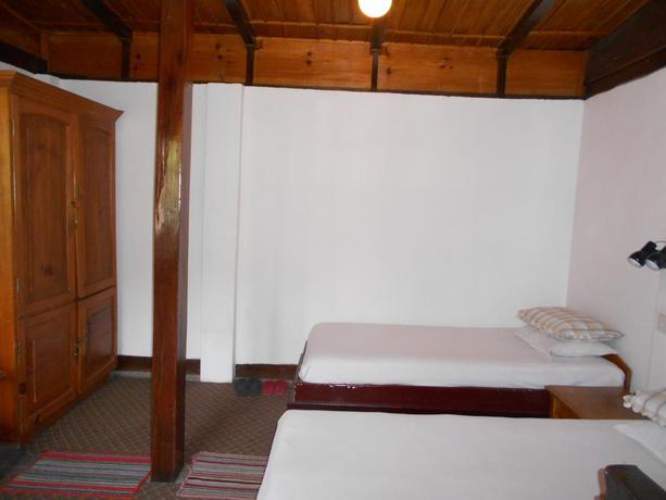 Imagen de la habitación del Hotel Krishna House. Foto 6