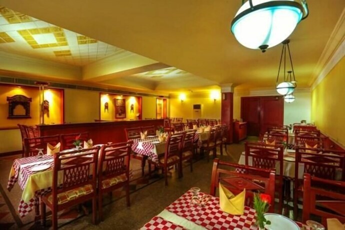 Imagen del bar/restaurante del Hotel Krishna Inn. Foto 18