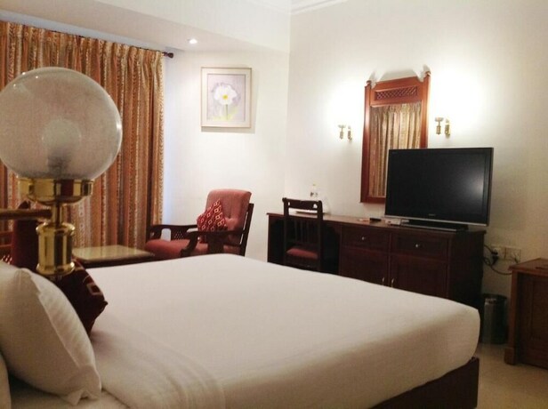 Imagen de la habitación del Hotel Krishna Inn. Foto 23