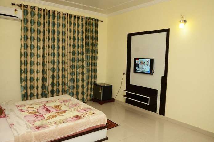 Imagen de la habitación del Hotel Krishna International, Vrindavan. Foto 3