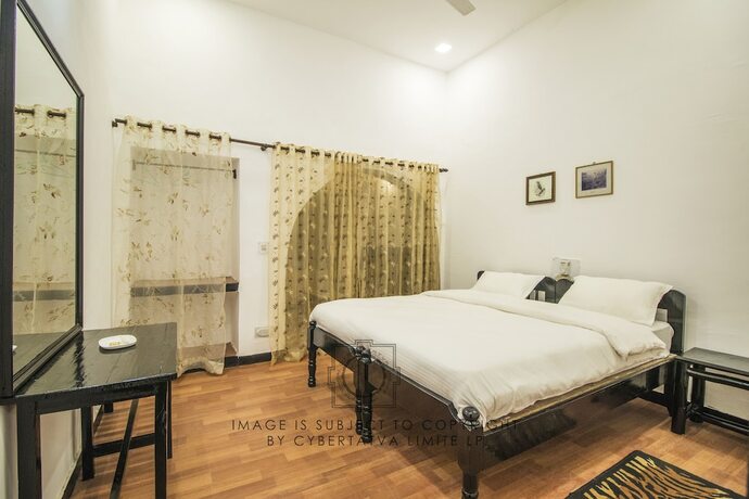 Imagen de la habitación del Hotel Krishna Jungle Resort. Foto 18