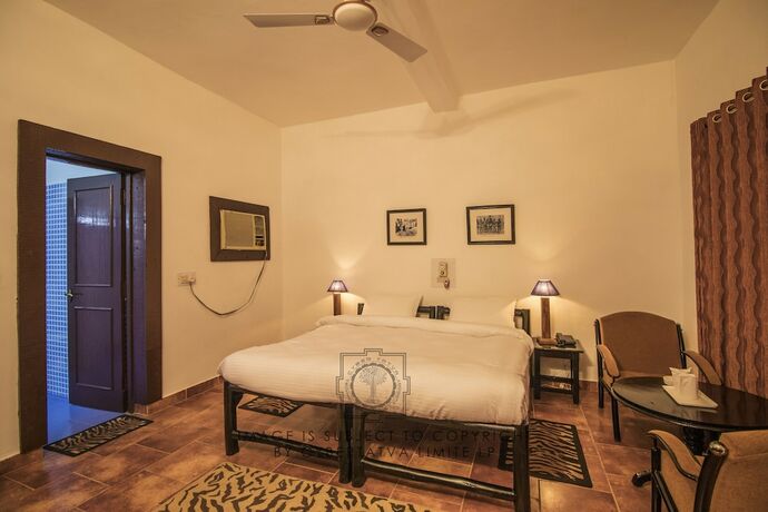 Imagen de la habitación del Hotel Krishna Jungle Resort. Foto 19