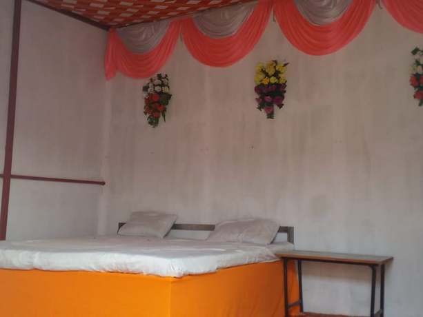 Imagen de la habitación del Hotel Krishna Kumbh Cottage. Foto 4
