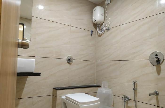 Imagen de la habitación del Hotel Krishna Palace, Anand. Foto 4