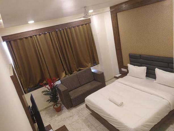 Imagen de la habitación del Hotel Krishna Palace, Anand. Foto 6