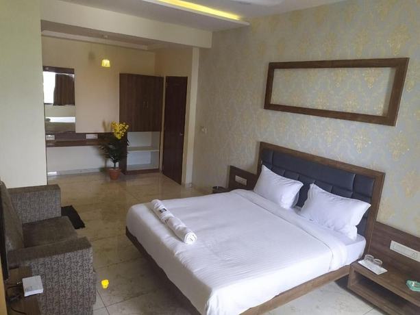 Imagen de la habitación del Hotel Krishna Palace, Anand. Foto 7