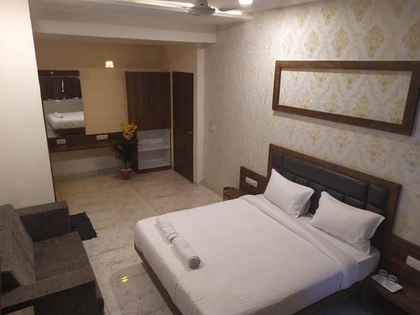 Imagen de la habitación del Hotel Krishna Palace, Anand. Foto 14