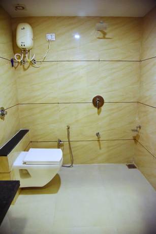 Imagen de la habitación del Hotel Krishna Palace, Anand. Foto 16
