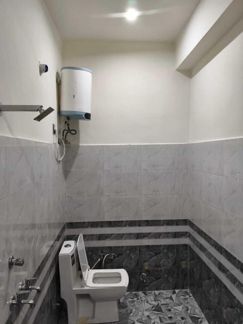 Imagen de la habitación del Hotel Krishna Residency By Vrindavan Stays. Foto 13