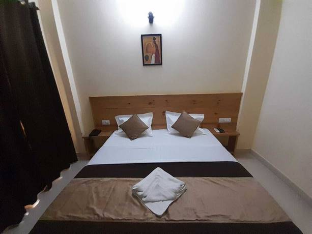 Imagen de la habitación del Hotel Krishna Rishikesh. Foto 1