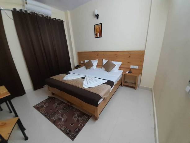 Imagen de la habitación del Hotel Krishna Rishikesh. Foto 2