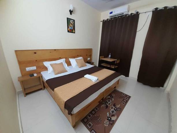 Imagen de la habitación del Hotel Krishna Rishikesh. Foto 5