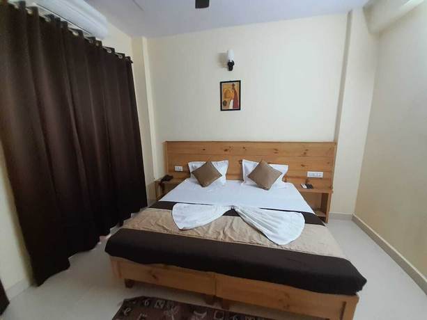 Imagen de la habitación del Hotel Krishna Rishikesh. Foto 6