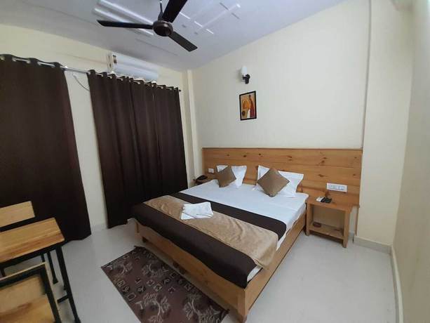 Imagen de la habitación del Hotel Krishna Rishikesh. Foto 10