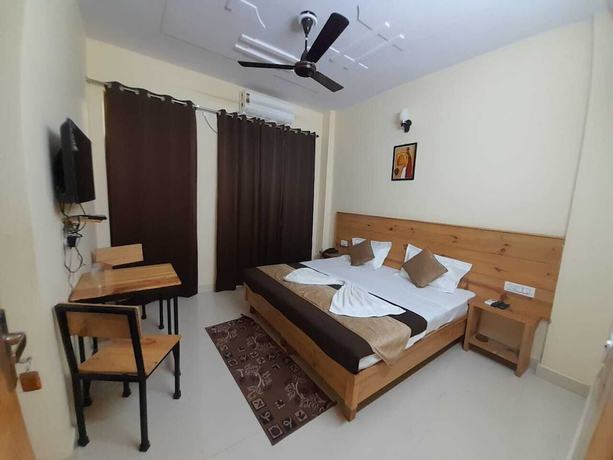 Imagen de la habitación del Hotel Krishna Rishikesh. Foto 11