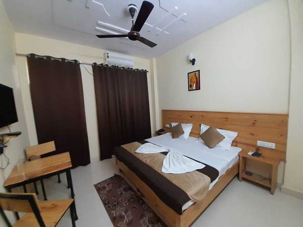 Imagen de la habitación del Hotel Krishna Rishikesh. Foto 12