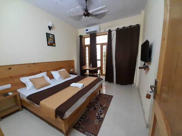 Imagen de la habitación del Hotel Krishna Rishikesh. Foto 13