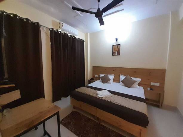 Imagen de la habitación del Hotel Krishna Rishikesh. Foto 15