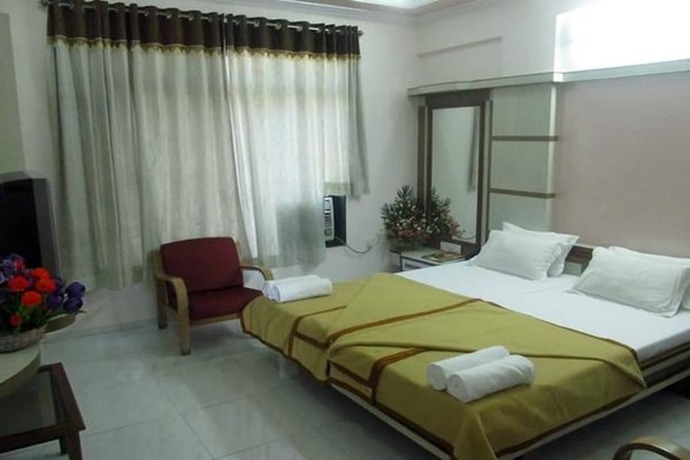 Imagen de la habitación del Hotel Krishna, Silvassa. Foto 10