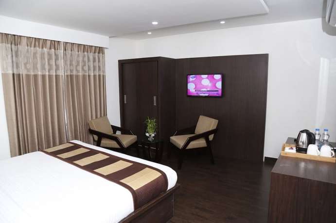 Imagen de la habitación del Hotel Krishna by KeyMagics. Foto 11