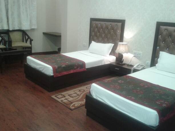 Imagen de la habitación del Hotel Krishnam. Foto 9