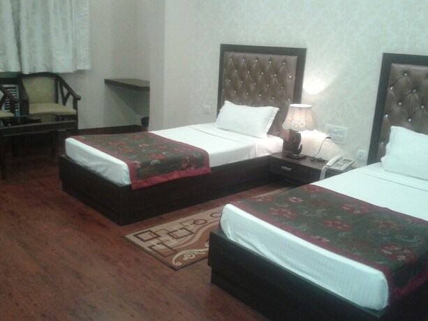 Imagen de la habitación del Hotel Krishnam. Foto 11