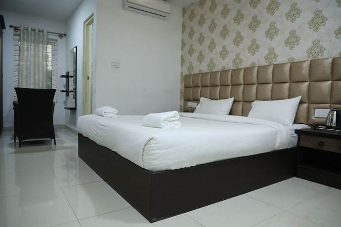Imagen de la habitación del Hotel Krishna\'s Landmark Business. Foto 2