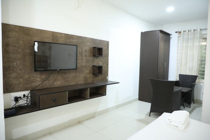 Imagen de la habitación del Hotel Krishna\'s Landmark Business. Foto 7