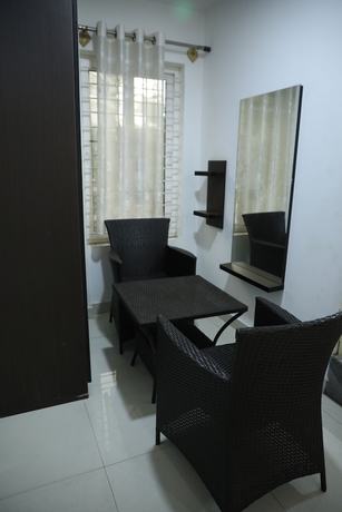 Imagen de la habitación del Hotel Krishna\'s Landmark Business. Foto 9