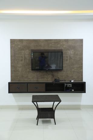 Imagen de la habitación del Hotel Krishna\'s Landmark Business. Foto 12