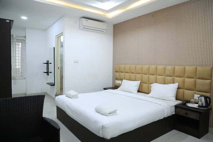 Imagen de la habitación del Hotel Krishna\'s Landmark Business. Foto 13