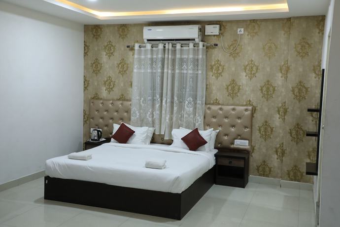 Imagen de la habitación del Hotel Krishna\'s Landmark Business. Foto 14