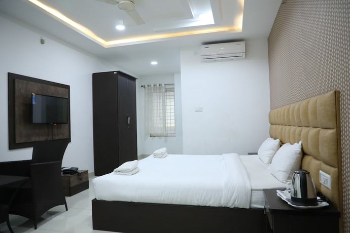Imagen de la habitación del Hotel Krishna\'s Landmark Business. Foto 20
