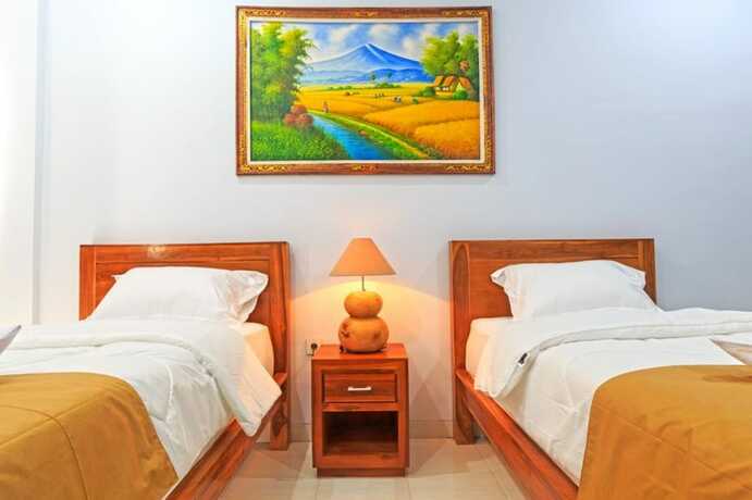 Imagen de la habitación del Hotel Krisnayogi Homestay. Foto 19