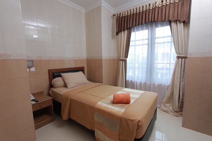 Imagen de la habitación del Hotel Kristina, Kota Yogyakarta. Foto 7