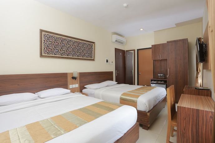 Imagen de la habitación del Hotel Kristina, Kota Yogyakarta. Foto 11