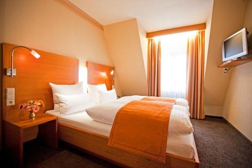 Imagen de la habitación del Hotel Krone, Gerlingen. Foto 8