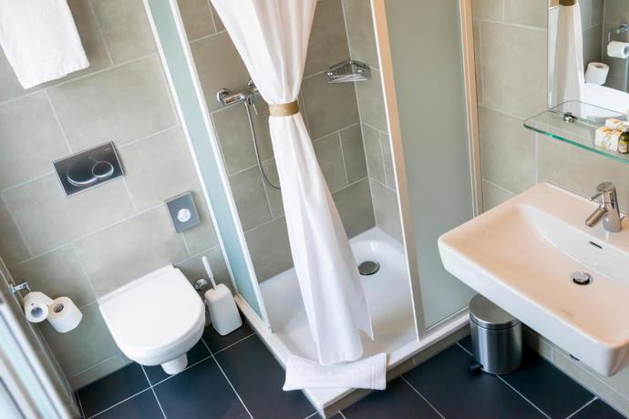 Imagen de la habitación del Hotel Krone Unterstrass. Foto 12