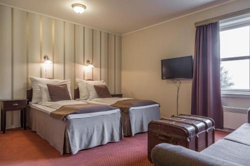 Imagen de la habitación del Hotel Kronen Gaard. Foto 8